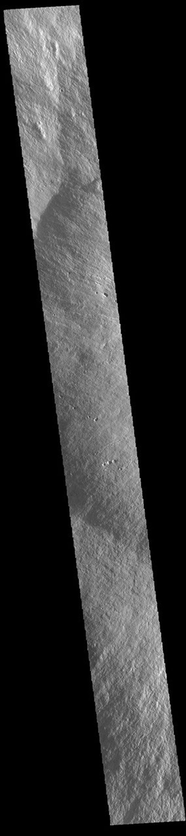 This image from NASA's Mars Odyssey shows the upper flank of Olympus Mons. Olympus Mons is the largest volcano in the solar system.