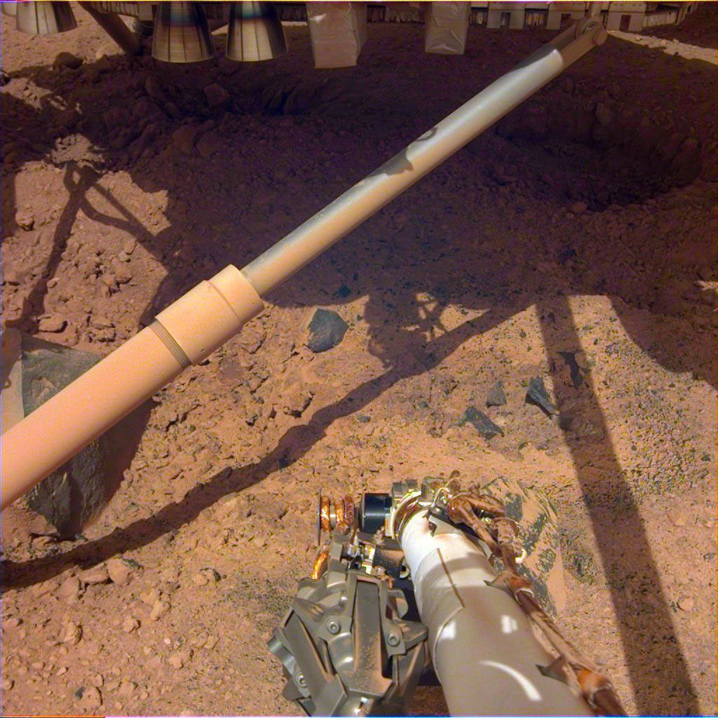Thrusters under NASA's InSight lander churned up soil during landing on Mars.