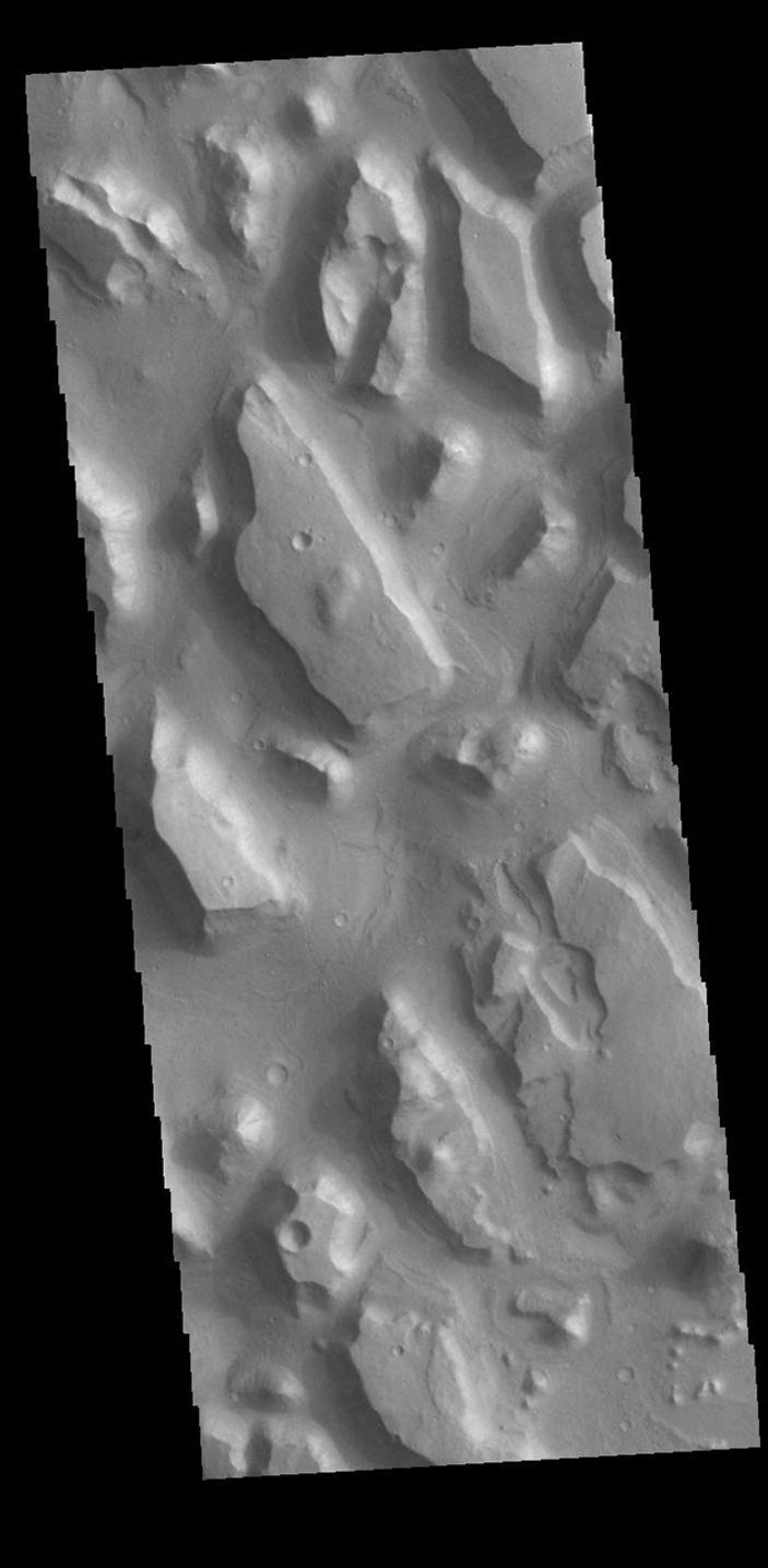 This image from NASA's Mars Odyssey shows part of Chryse Chaos near the terminal end of the huge outflow channels draining from Valles Marineris into the Chyrse Basin.