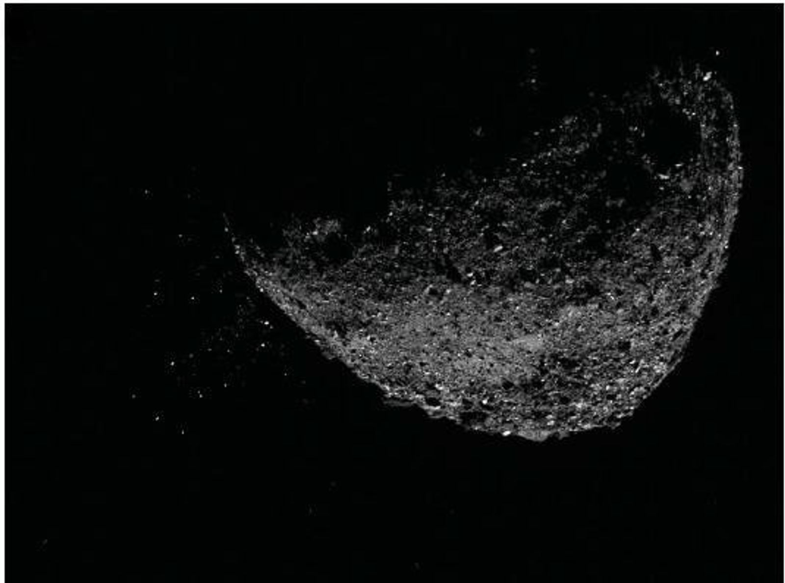 OSIRIS-REx image of particles being ejected from asteroid Bennu