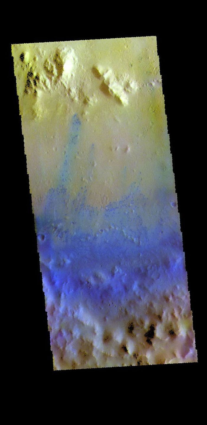 This image from NASA's Mars Odyssey shows part of the inner rim, central peak ring and floor of Sagan Crater.