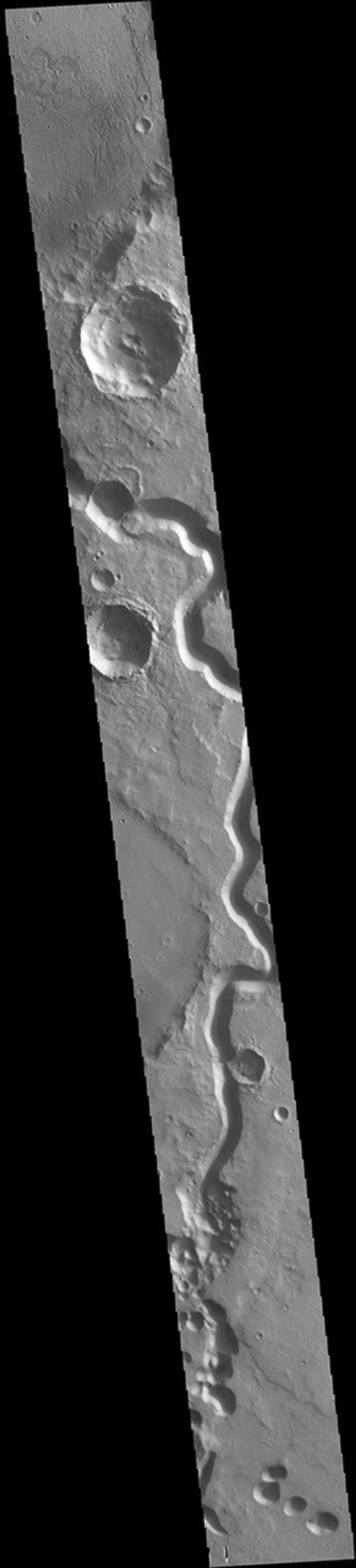 This image from NASA's Mars Odyssey shows a sinuous channel, Tinto Vallis.