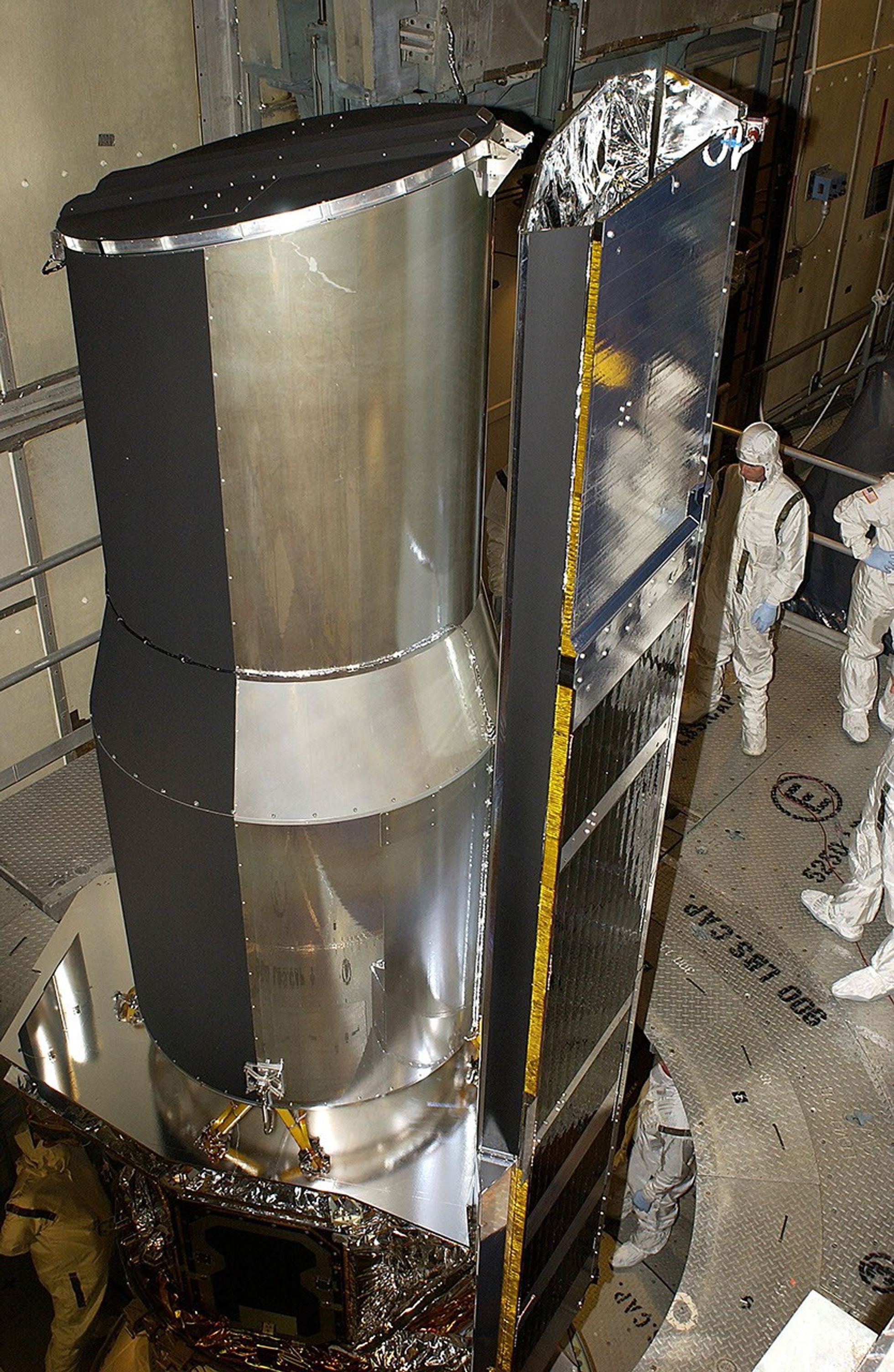 The Spitzer Space Telescope (formerly the Space Infrared Telescope Facility or SIRTF) is readied for launch at Cape Canaveral Air Force Station, in 2003.