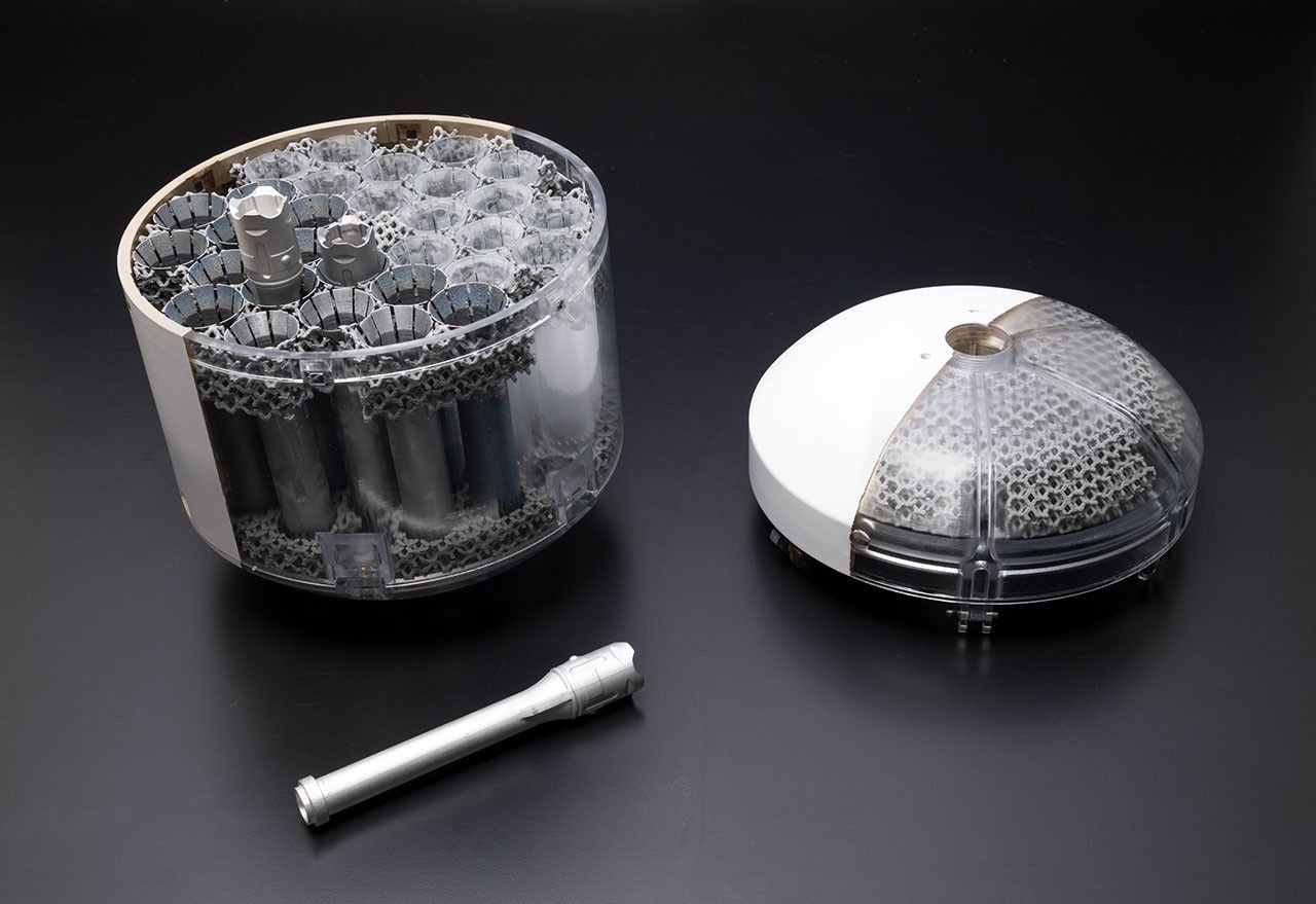 This image shows a concept model of NASA's orbiting sample container, which will hold tubes of Martian rock and soil samples that will be returned to Earth through a Mars sample return campaign.