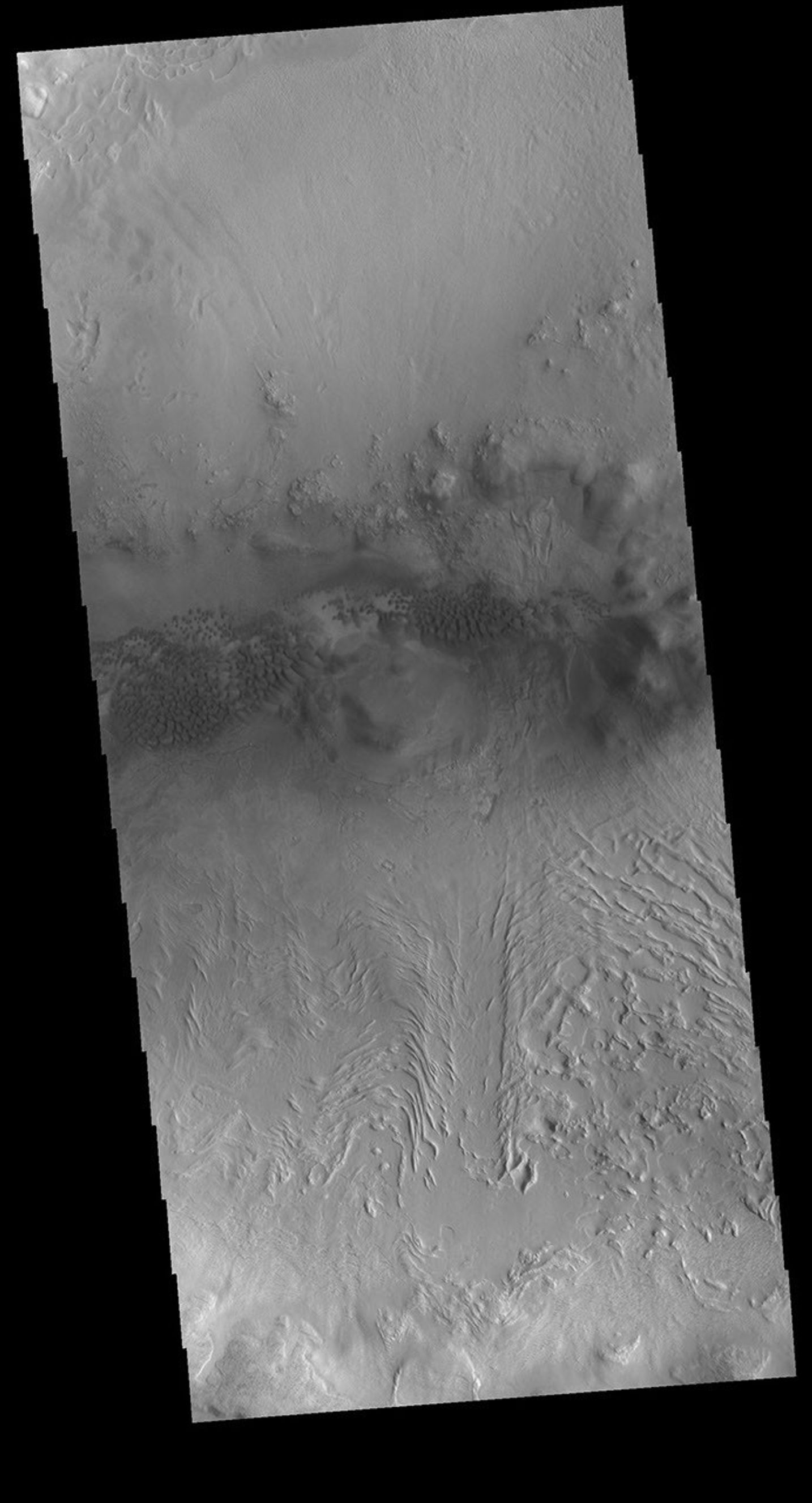 This image from NASA's Mars Odyssey shows sand dunes on the floor of an unnamed crater located between Terra Sabaea and Utopia Planitia.