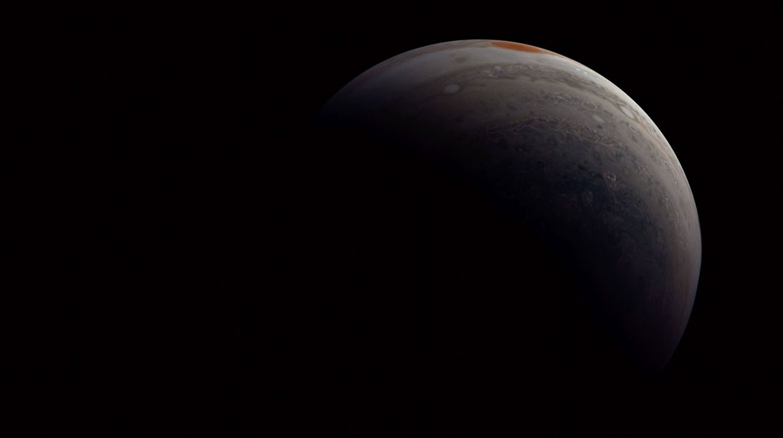During the closest approach of this pass, NASA's Juno spacecraft came within approximately 2,100 miles (3,400 kilometers) of Jupiter's cloud tops.