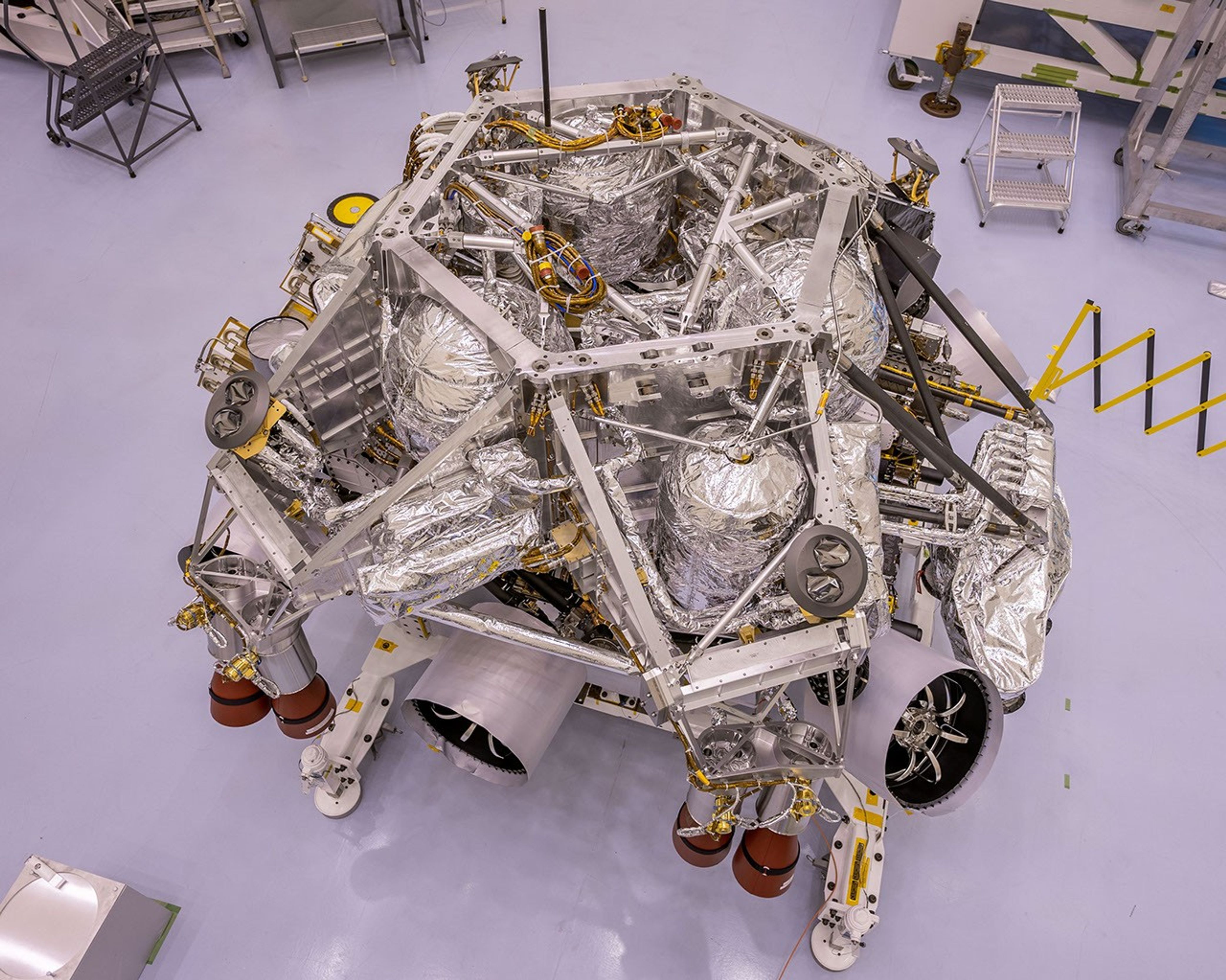 This image of the rocket-powered descent stage sitting on to of NASA's Perseverance rover was taken in a clean room at Kennedy Space Center on April 29, 2020.