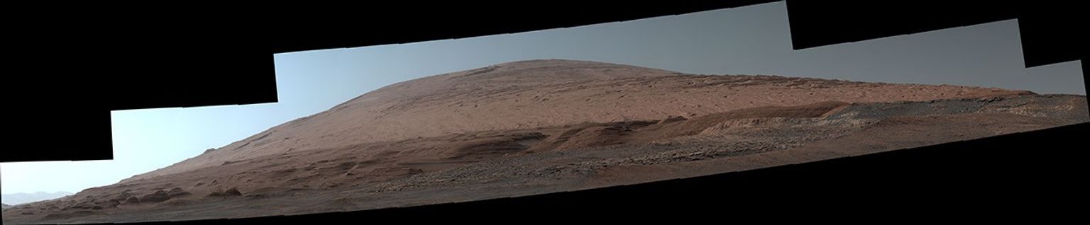 The Mast Camera, or Mastcam, on NASA's Curiosity Mars rover used its telephoto lens to capture Mount Sharp in the morning illumination on Oct. 13, 2019.
