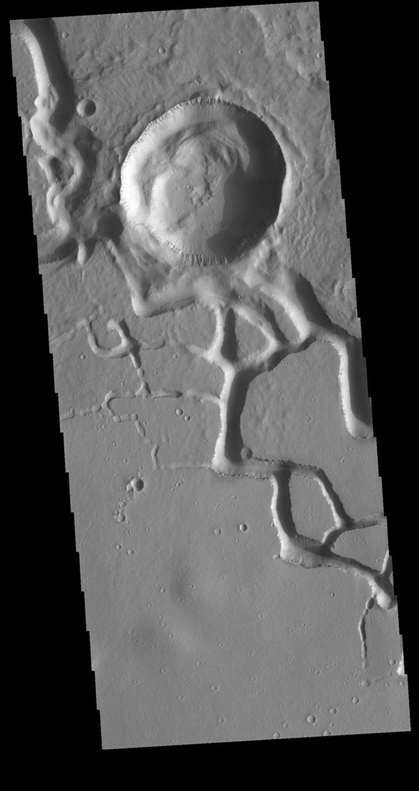 This image from NASA's Mars Odyssey shows the central portion of Hephaestus Fossae.