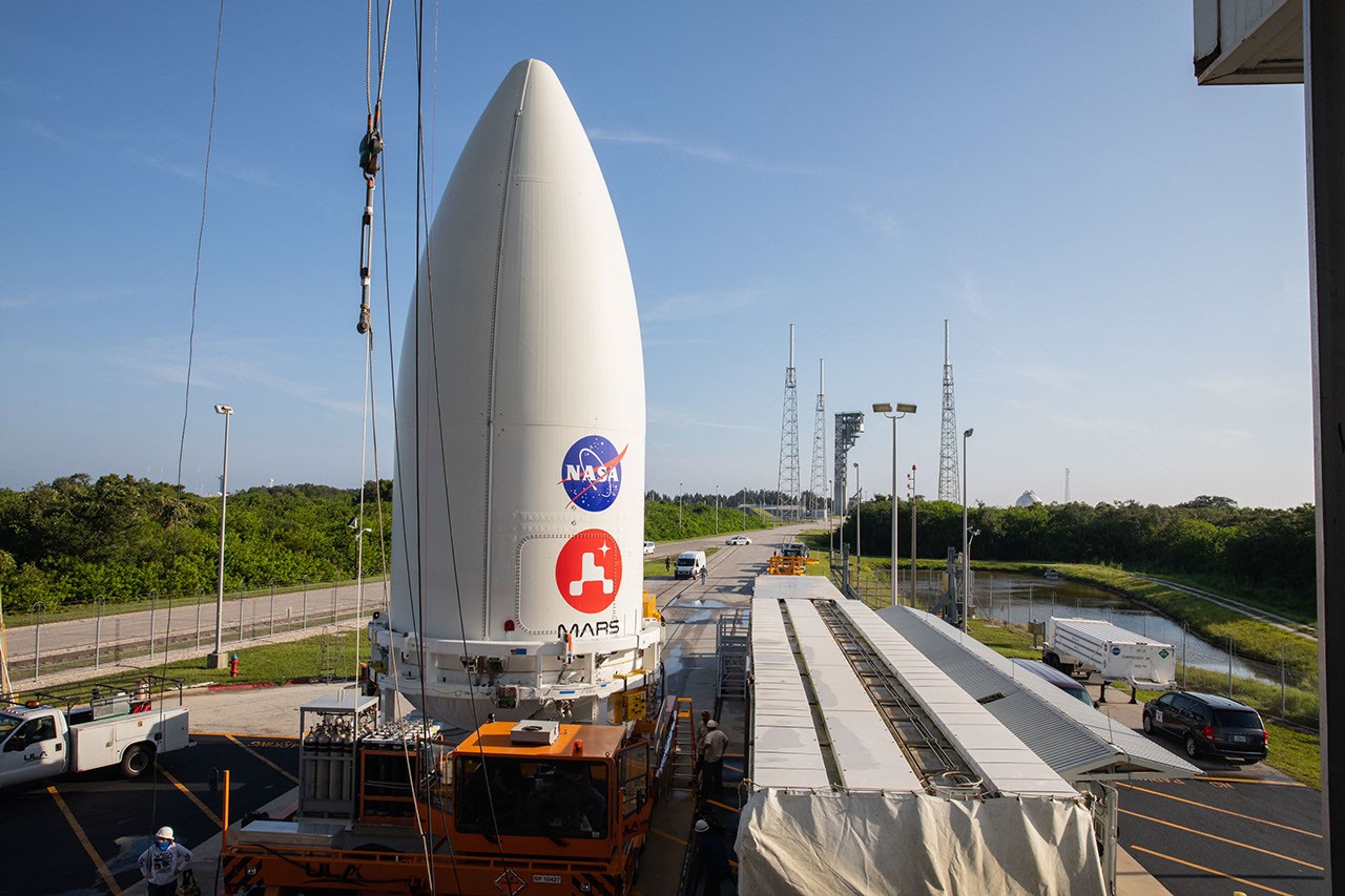 The nose cone containing the Mars 2020 Perseverance rover sits atop a motorized payload transporter at Cape Canaveral Air Force Station in Florida on July 7, 2020.