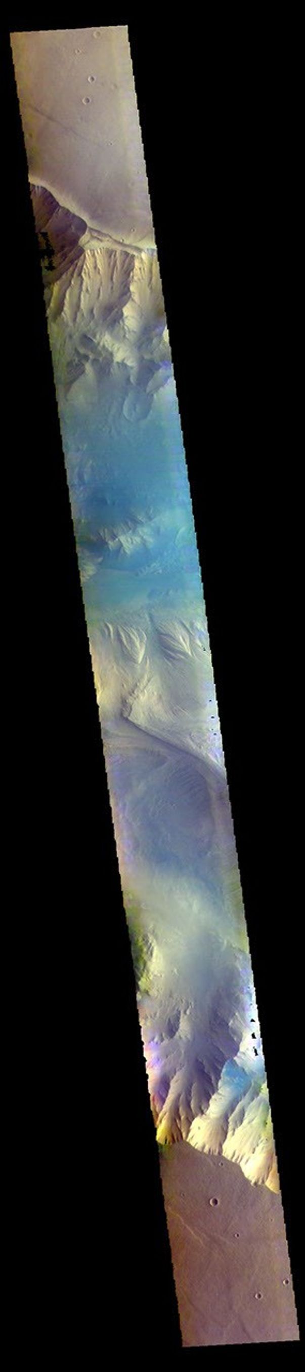 This image from NASA's Mars Odyssey shows part of eastern Candor Chasma. Candor Chasma is one of the largest canyons that make up Valles Marineris.