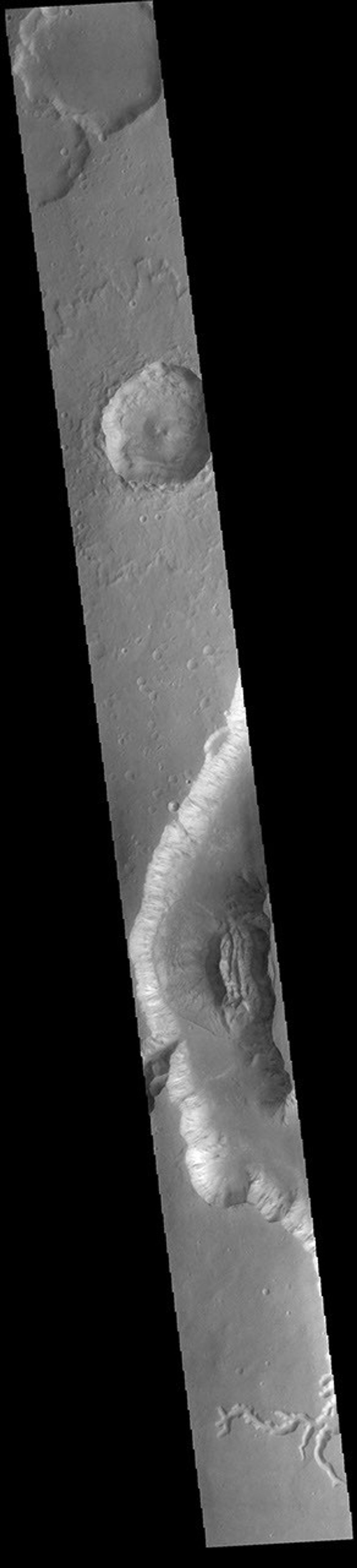 This image from NASA's Mars Odyssey shows a small section of Shalbatana Vallis. Located in Xanthe Terra, Shalbatana Vallis is an outflow channel carved by massive floods.