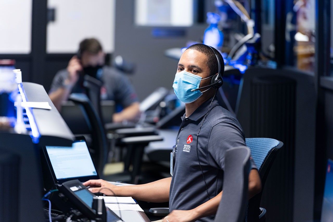 Matt Smith, flight director for the second Mars 2020 mission trajectory correction maneuver (TCM-2), studying the screens at NASA's Jet Propulsion Laboratory in Southern California.