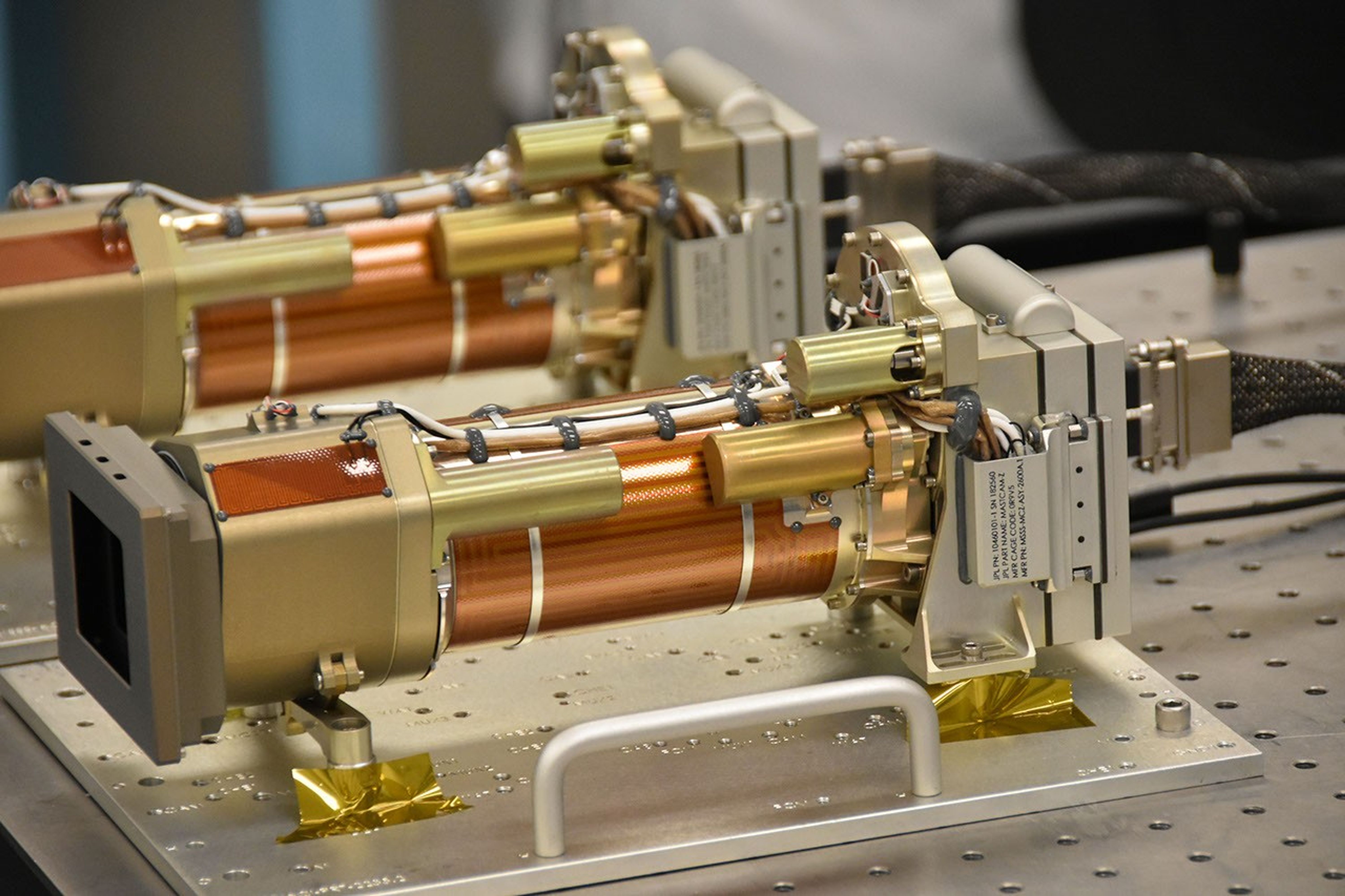 The Mars 2020 Mastcam-Z cameras are on a workbench during their assembly at Malin Space Science Systems in San Diego.