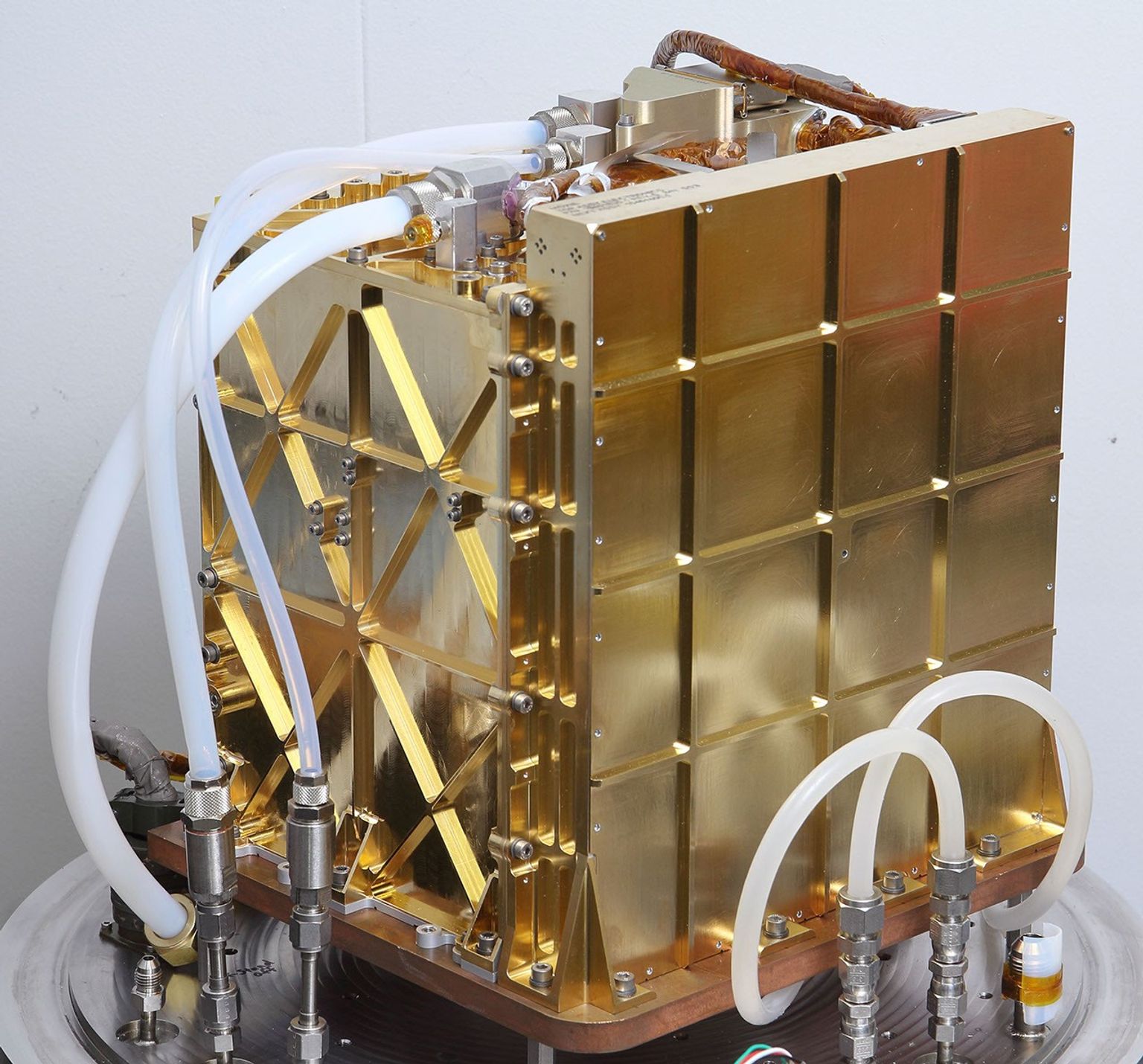 The engineering model (EM), an almost identical twin of Mars 2020's MOXIE, is used for testing in the lab at NASA's Jet Propulsion Laboratory in Pasadena, California.