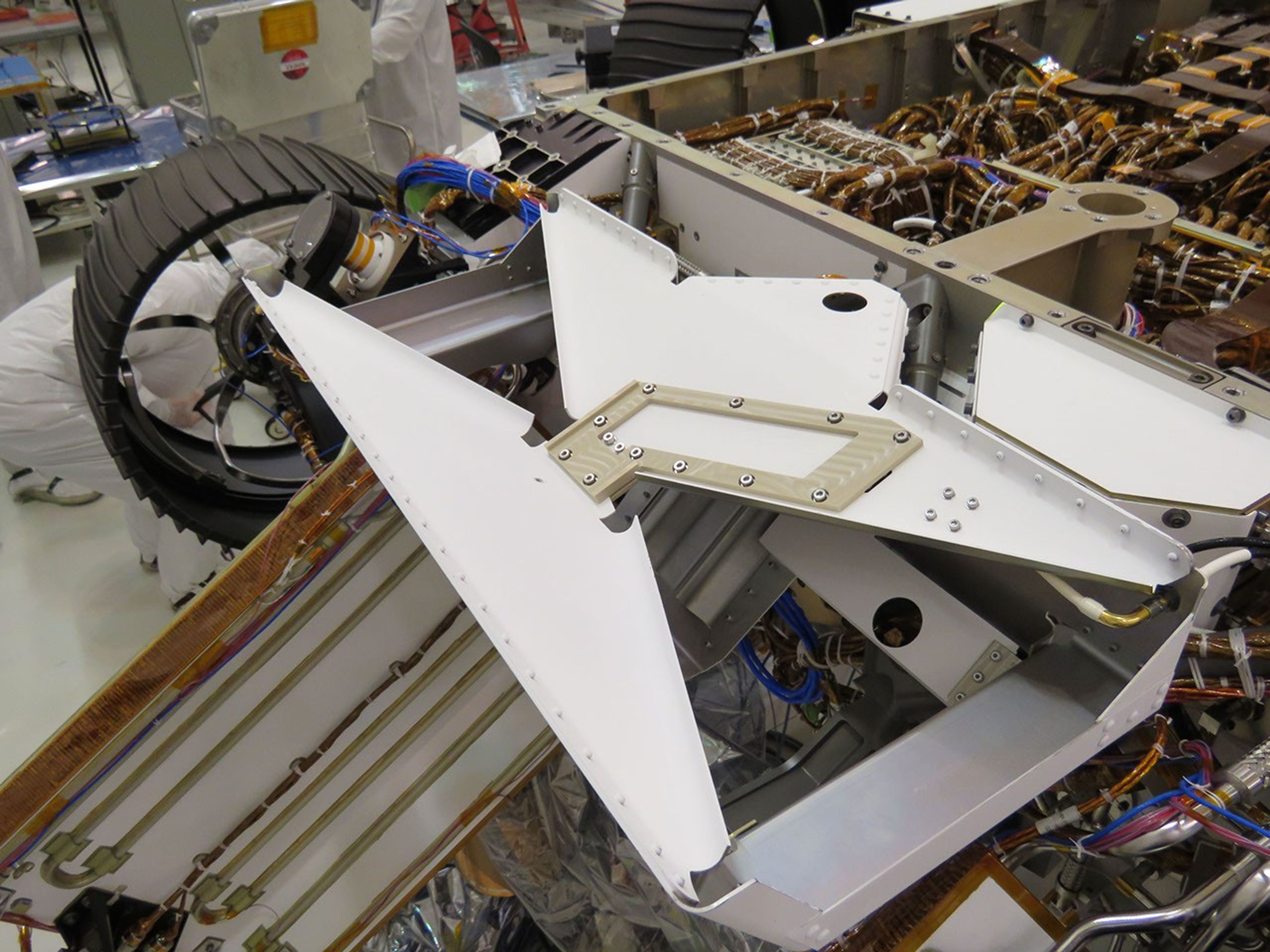 The bowtie-shaped antenna for the Radar Imager for Mars' Subsurface Experiment (RIMFAX) instrument has been mounted on the underside of the Perseverance rover.