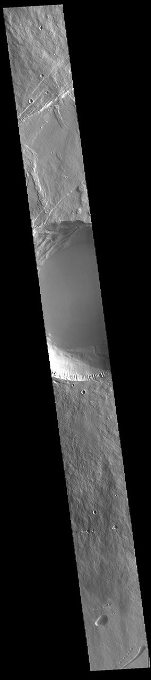 This image from NASA's Mars Odyssey shows a cross section of Pavonis Mons, including the central part of the smaller summit caldera.