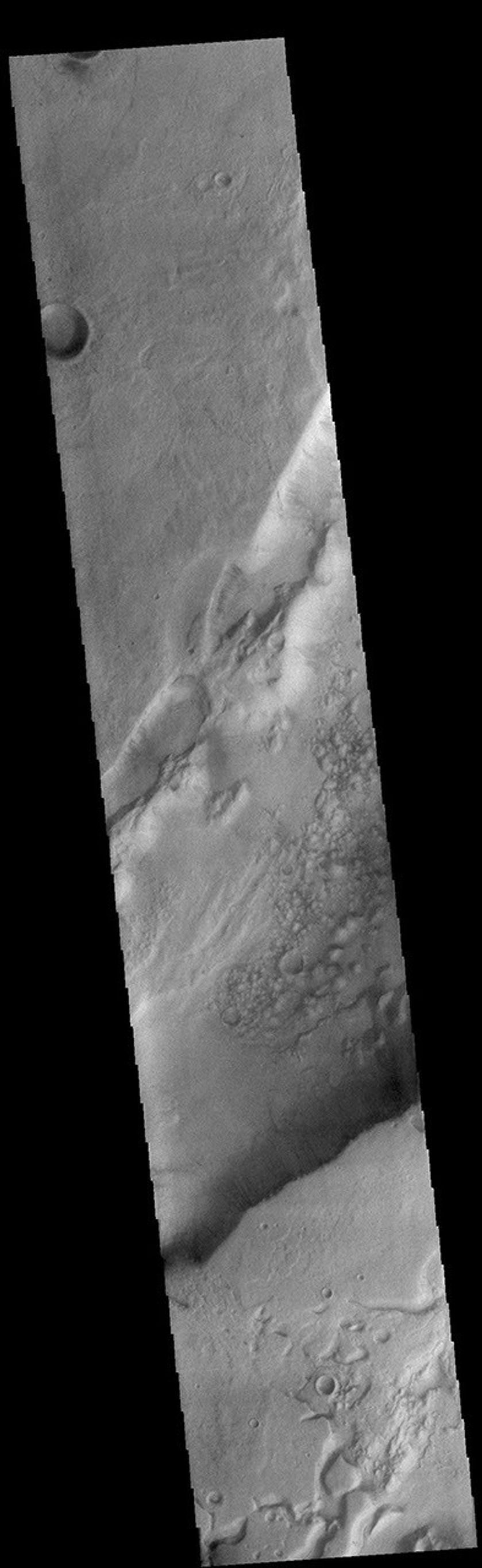 This image from NASA's Mars Odyssey shows a small portion of Dao Vallis. Located south of Hadriacus Mons (a volcano), this channel is approximately 1200km (750 miles) long.