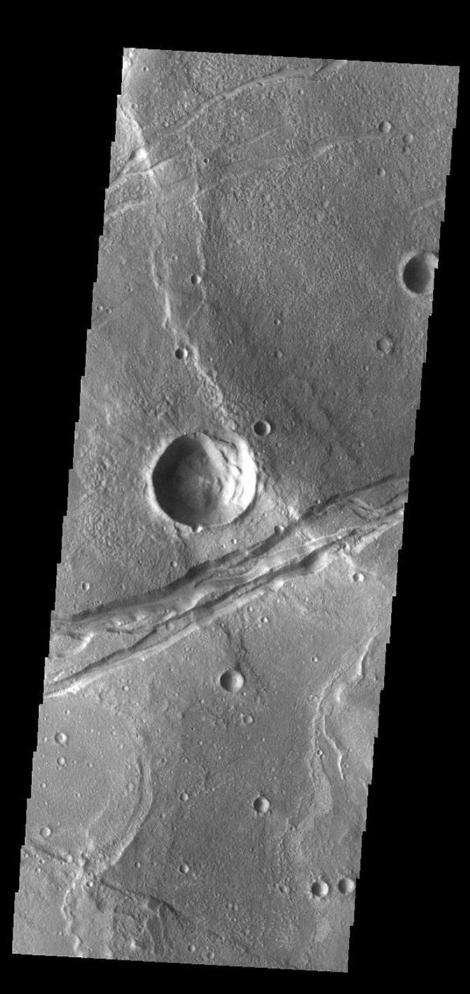 This image from NASA's Mars Odyssey shows a linear depression, part of Sirenum Fossae.