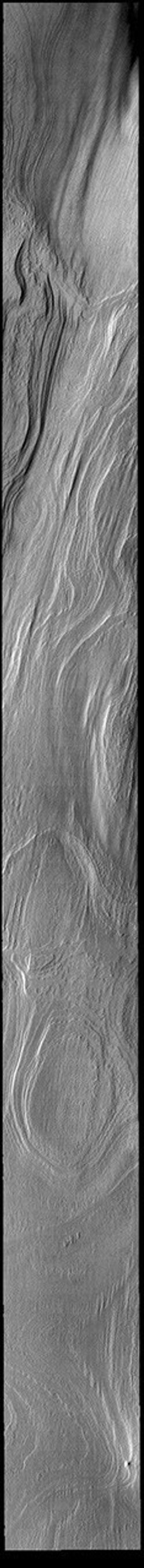 This image from NASA's Mars Odyssey shows part of the south polar cap. The cap was created over millions of years with deposition of ice and dust during different seasons.