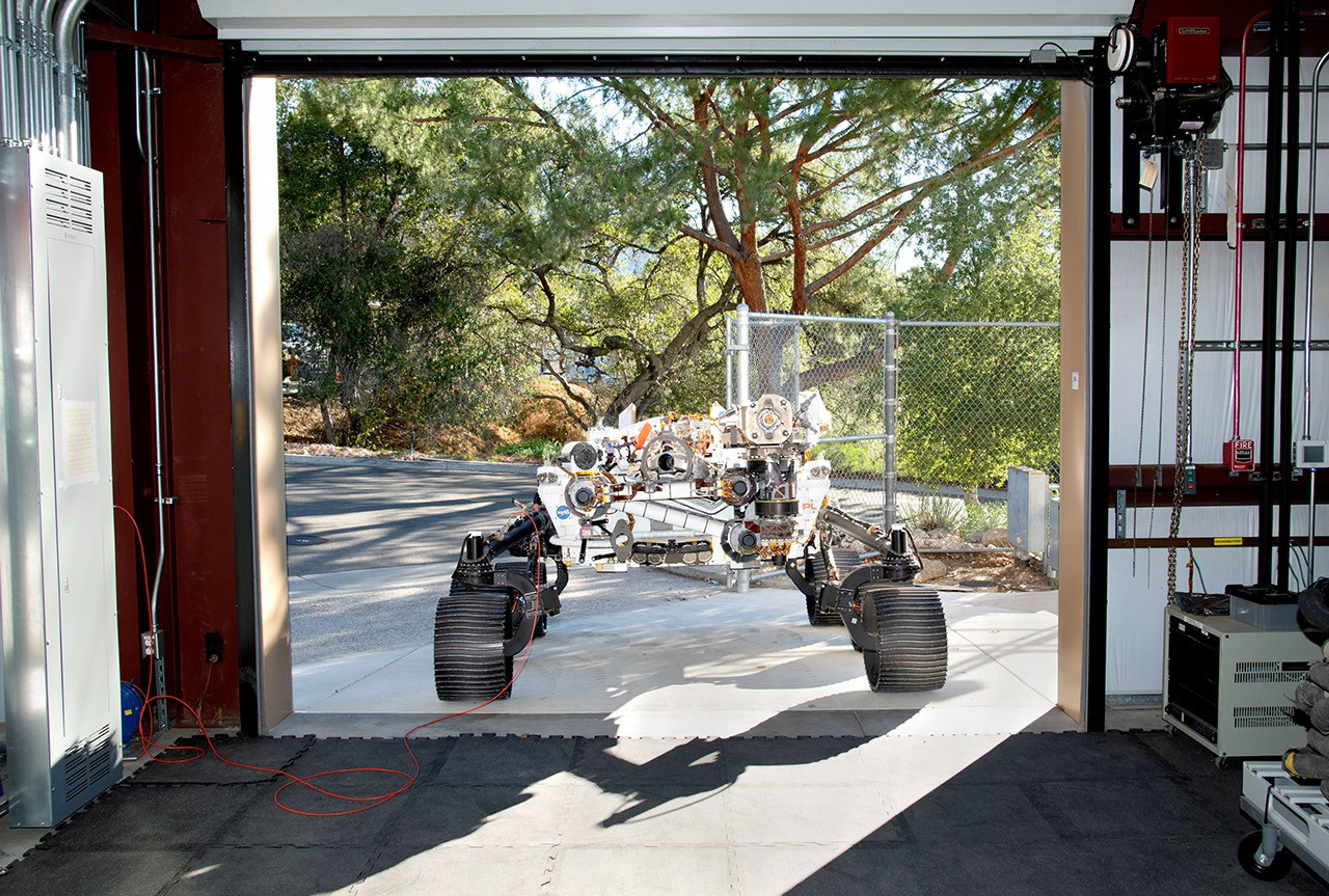 OPTIMISM faces a doorway of JPL's Mars Yard garage shortly after arriving there on October 29, 2021.