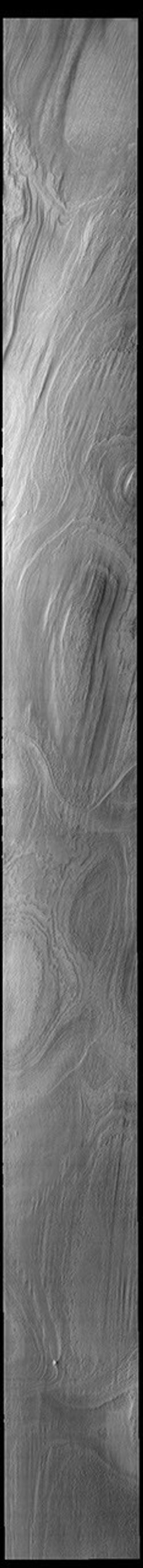 This image from NASA's Mars Odyssey shows a portion of the south polar cap. The visible layers were created over millennia by deposition of winter ice and summer dust.