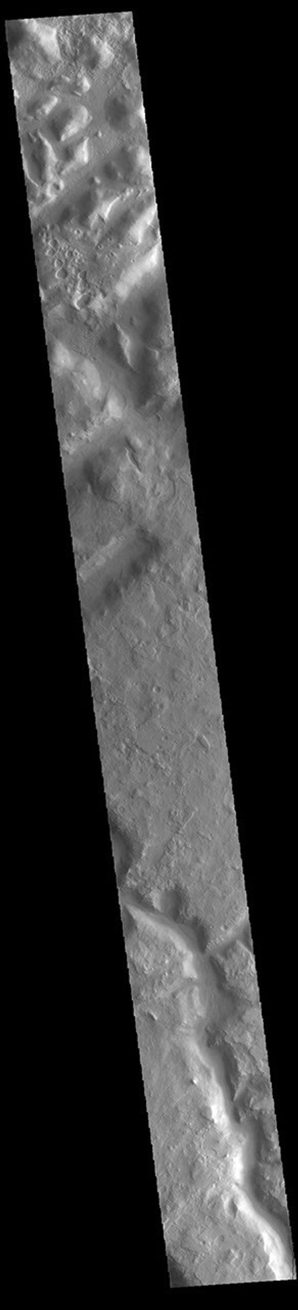This image from NASA's Mars Odyssey shows part of Huo Hsing Vallis. Huo Hsing Vallis arose in Terra Sabaea, and flowed down from the highlands into the lowland region of Nilosyrtis Mensa.