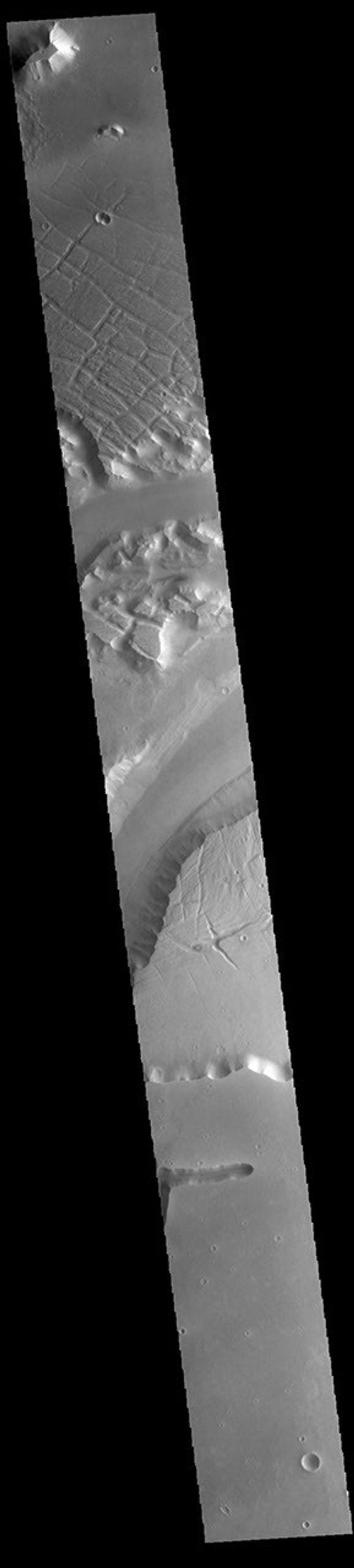 This image from NASA's Mars Odyssey shows a portion of Kasei Valles. Kasei Valles is one of the largest outflow channel systems on Mars.
