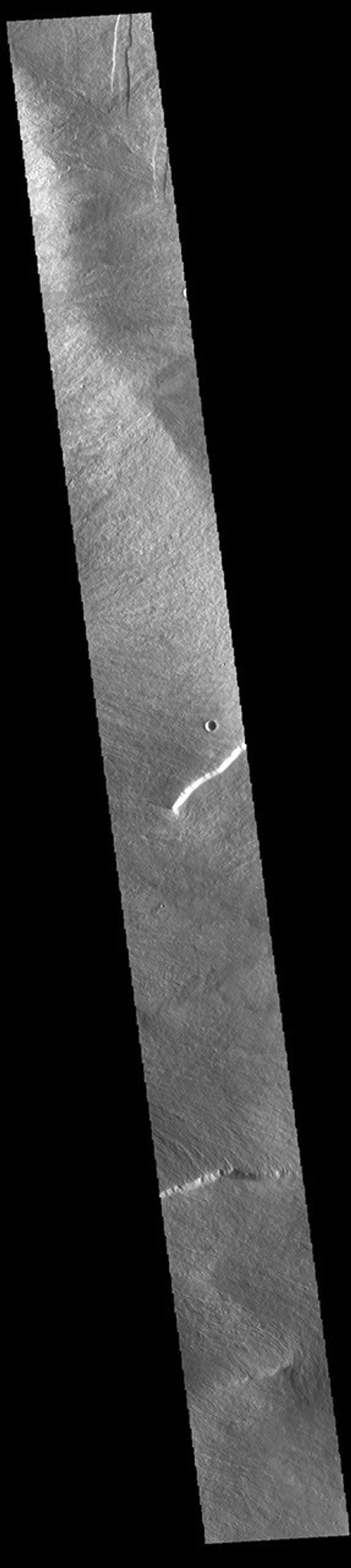 This image from NASA's Mars Odyssey shows the lower flank of Olympus Mons.