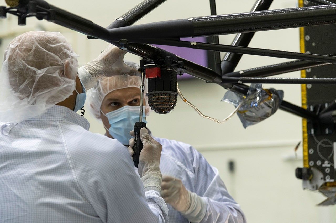 Engineers at NASA's Jet Propulsion Laboratory in Southern California integrate the magnetometer instrument into the agency's Psyche spacecraft on June 28, 2021. The instrument will help determine if the Psyche asteroid is part of a planetesimal.