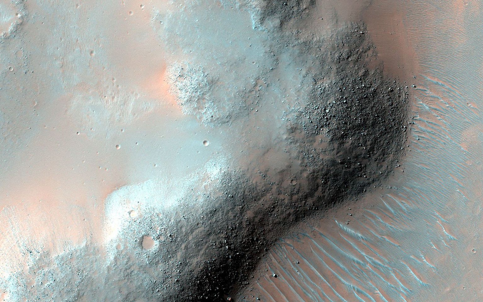 This image acquired on May 19, 2012 by NASA's Mars Reconnaissance Orbiter, shows a ridge that formed when the ground was pushed together, forming a wrinkle.