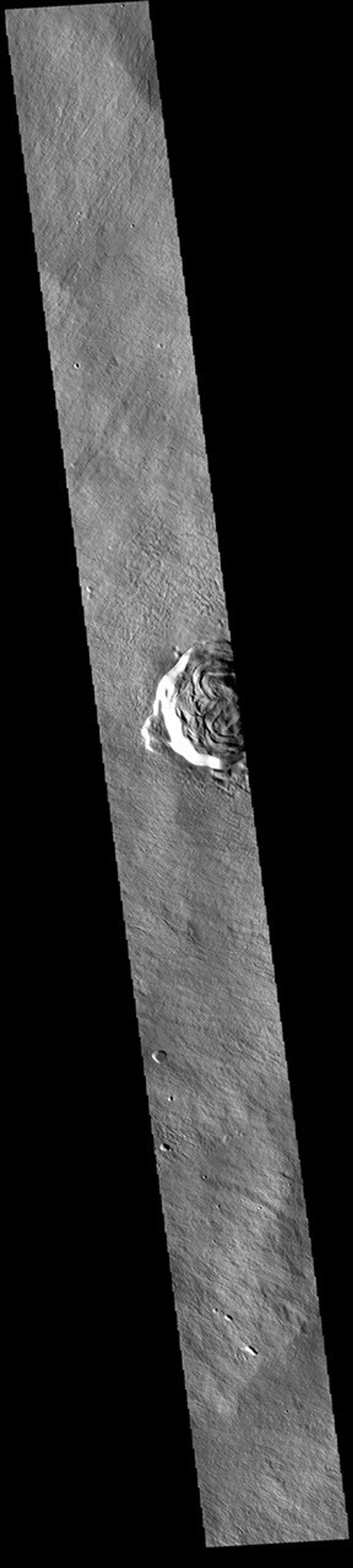 This image from NASA's Mars Odyssey shows part of Karzok Crater. This crater is one of two located on the flanks of Olympus Mons.