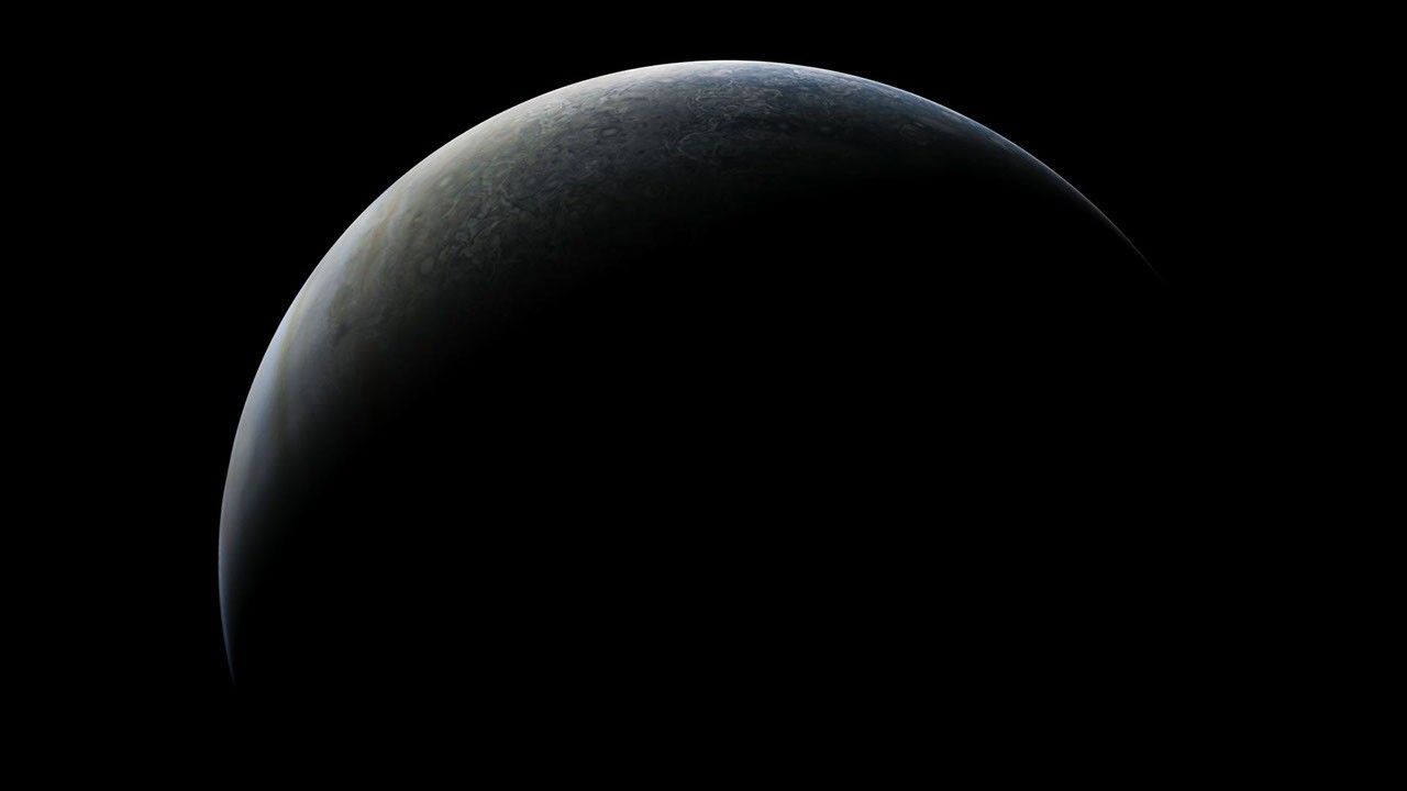 A View of Crescent Jupiter from Juno - NASA Science