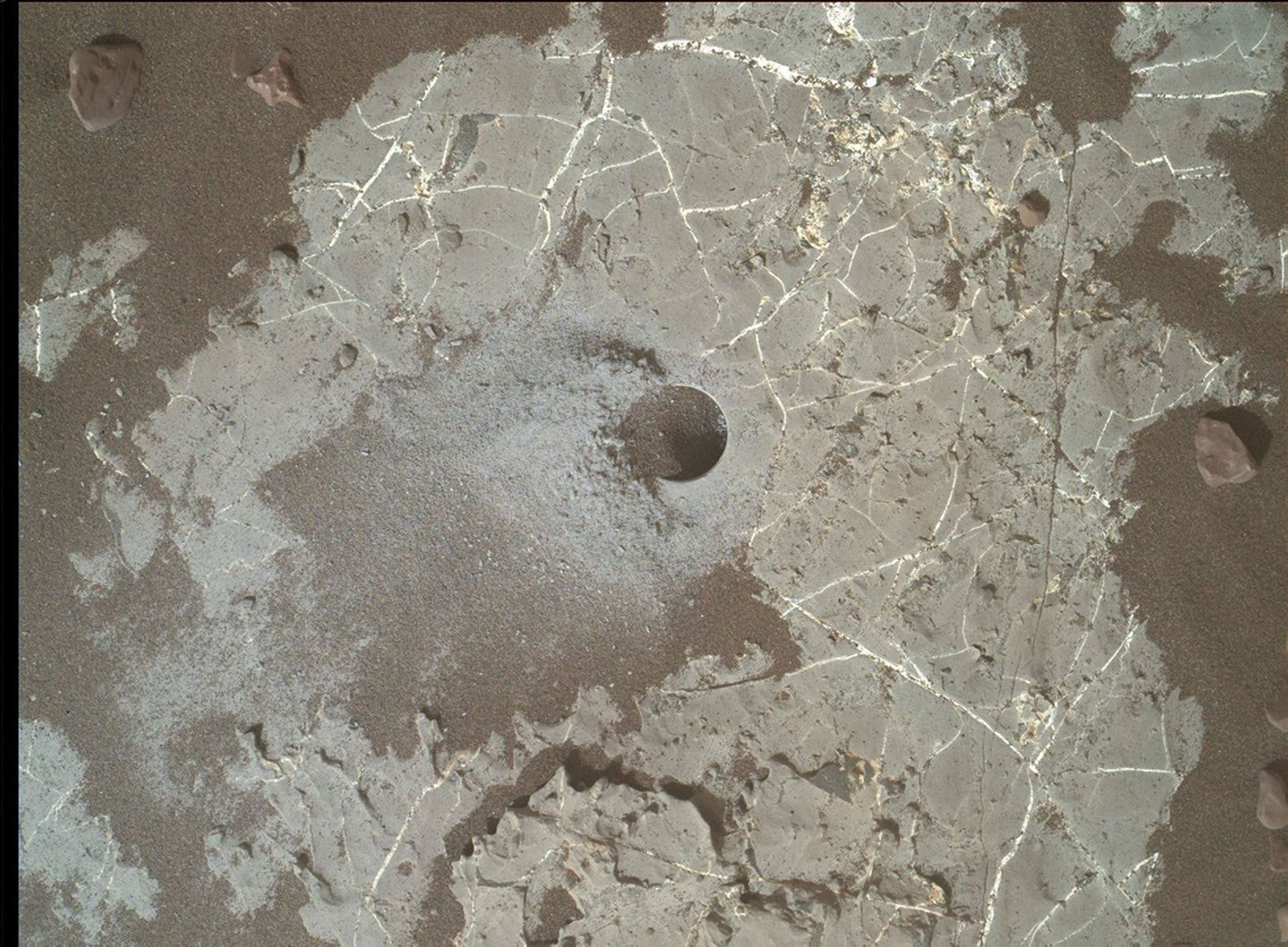 This image shows the Highfield drill hole made by NASA's Mars Curiosity rover as it was collecting a sample on Vera Rubin Ridge in Gale Crater.