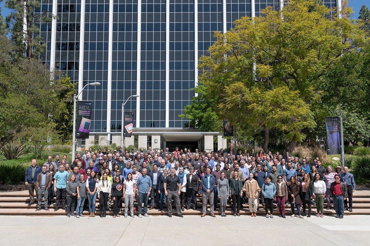 Members of NASA's Psyche mission pose at JPL in April 2022.