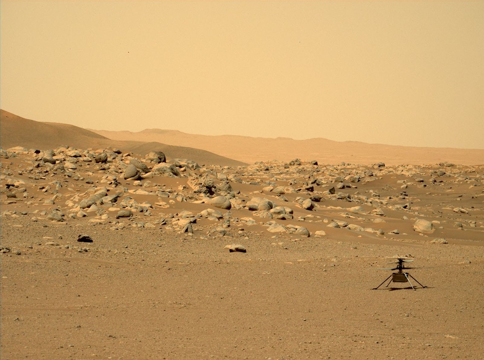 This image of NASA's Ingenuity Mars Helicopter was taken by the Mastcam-Z instrument of the Perseverance rover on June 15, 2021. The location, Airfield D, is just east of the S&eacute;&iacute;tah geologic unit.