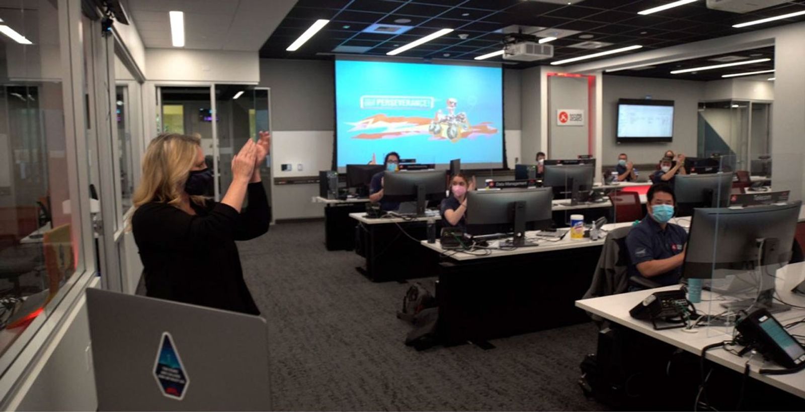 Jennifer Trosper, Mars Perseverance project manager, leads rover team members at JPL in a round of applause for students who were honored through the You've Got Perseverance campaign.