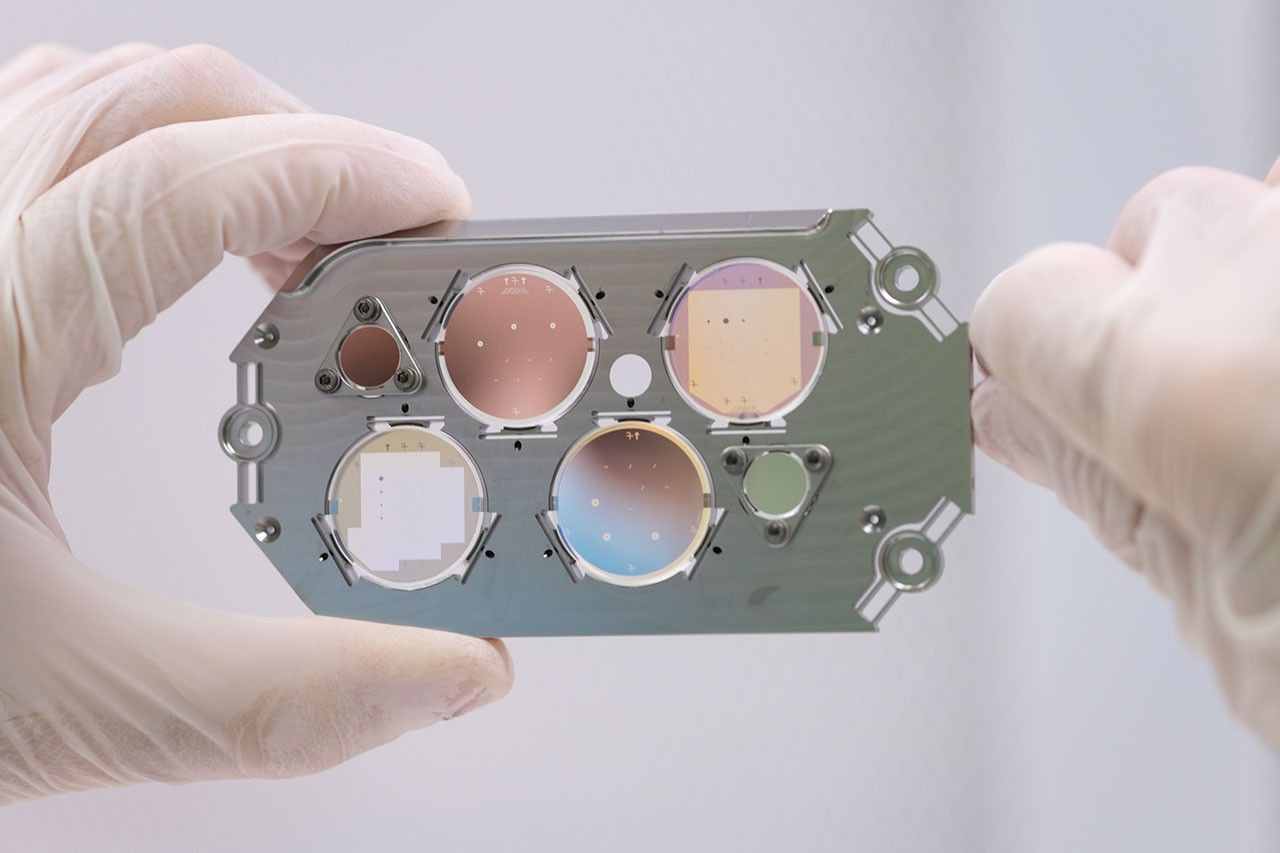 The focal plane mask for the Roman Coronagraph Instrument, shown here, helps block starlight and reveal hidden planets. Each circular section contains carefully engineered, opaque obstructions designed to block starlight.