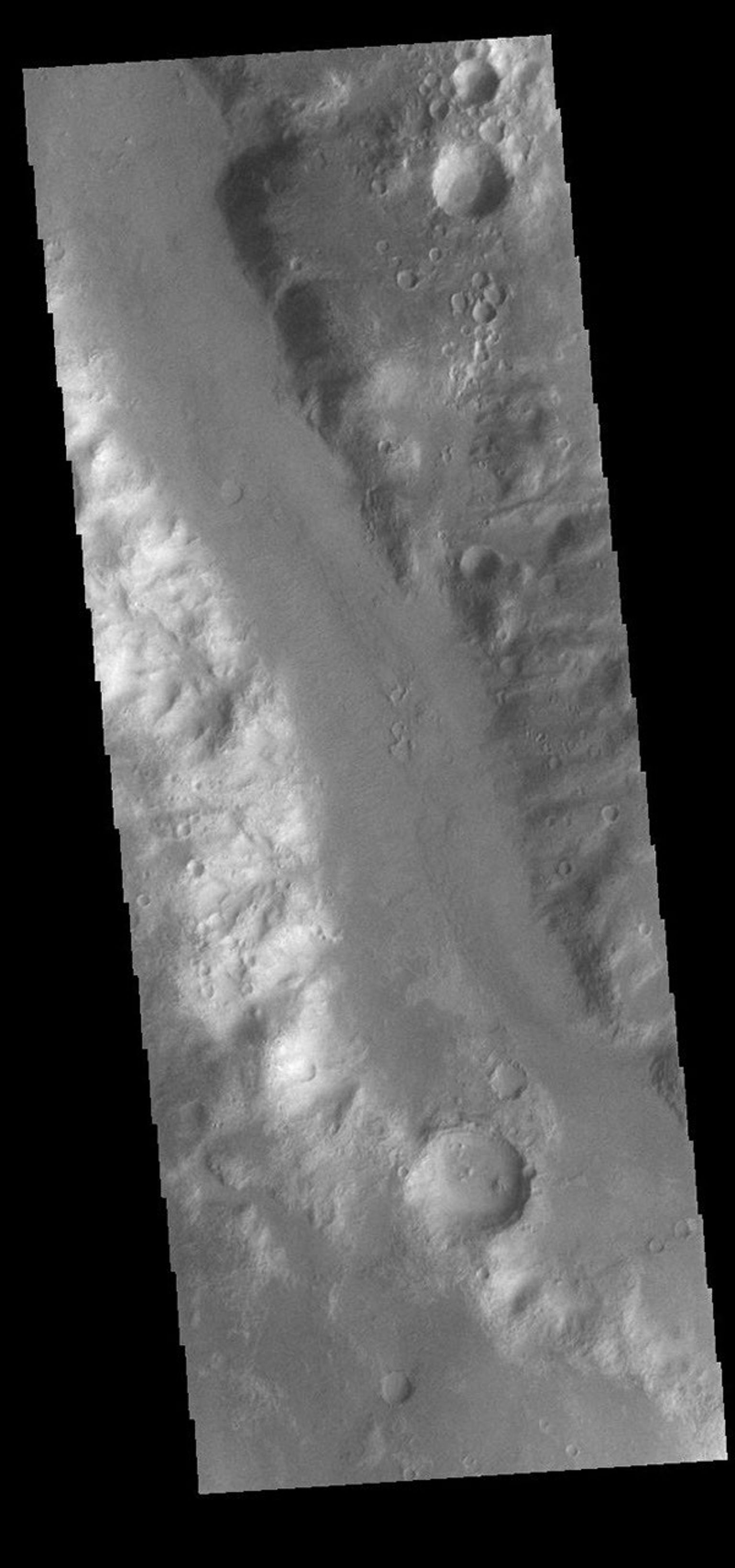 This image from NASA's Mars Odyssey shows a small section of Uzboi Vallis. This valley system arises just north of Argyre Planitia and flows northward into Holden Crater.