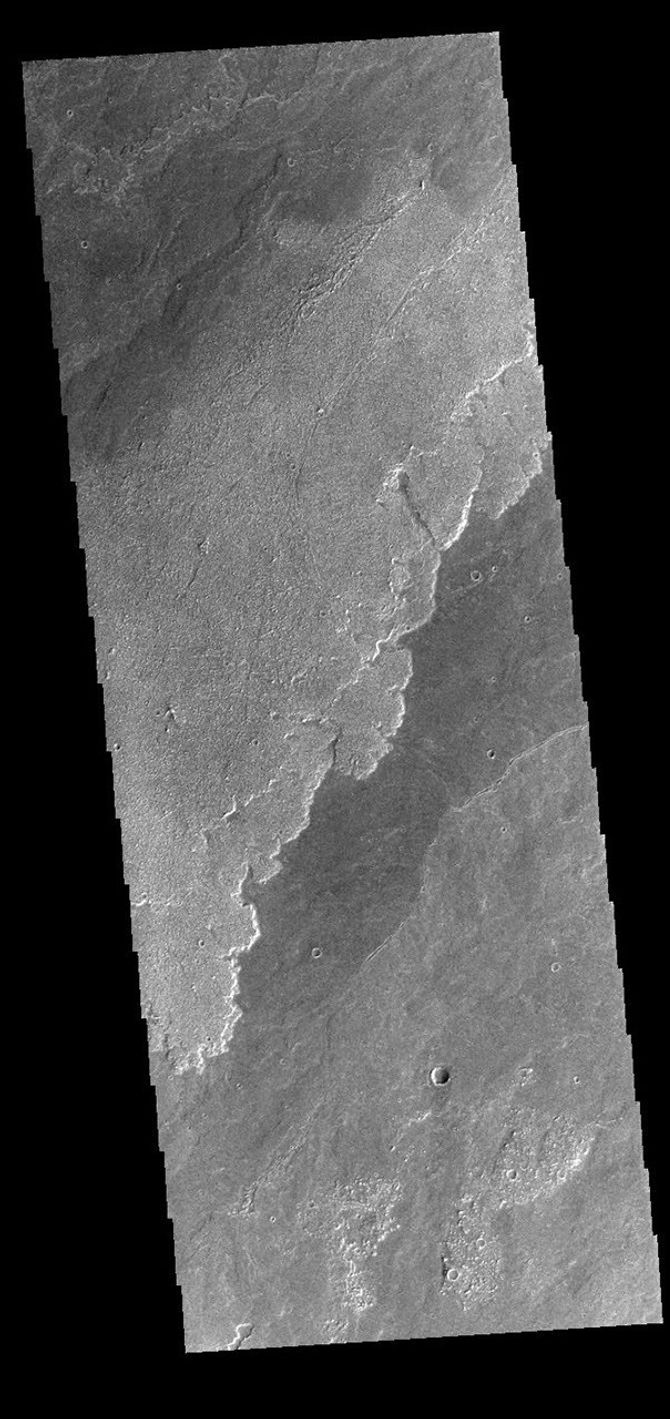 This image from NASA's Mars Odyssey shows a small portion of the immense lava flows that originated from Arsia Mons.