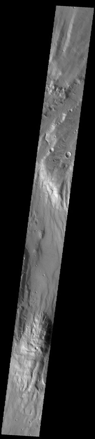 This image from NASA's Mars Odyssey shows an unnamed region of fractures and graben, located south of Solis Planum, between Claitas Fossae and Coracis Fossae.
