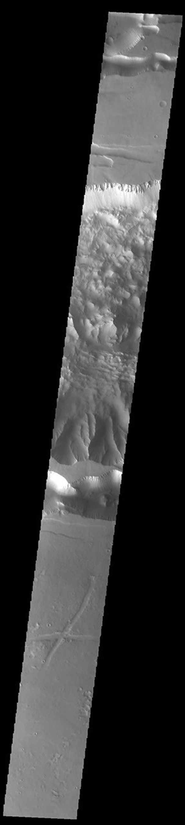 This image from NASA's Mars Odyssey shows Ius Chasma, at the western end of Valles Marineris, south of Tithonium Chasma.