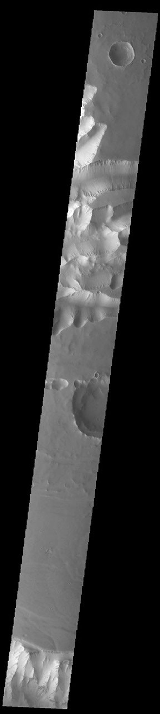 This image from NASA's Mars Odyssey shows the part of the eastern end of Tithonium Chasma. Tithonium Chasma is at the western end of Valles Marineris.