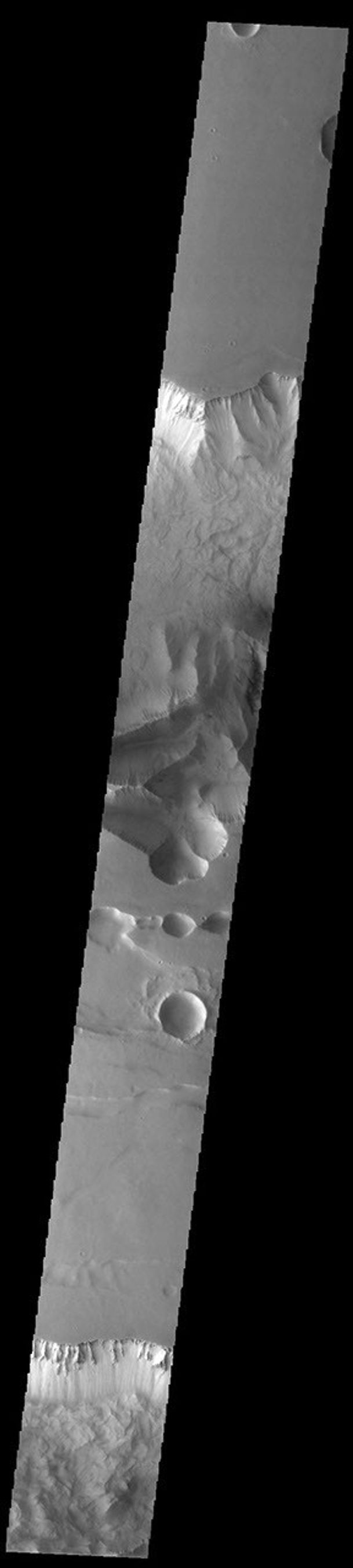 This image from NASA's Mars Odyssey shows Ius and Tithonium Chasmata, located at the western end of Valles Marineris.
