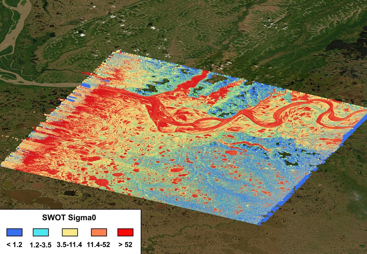 The mighty Yukon River and nearby lakes appear in red in this image produced using data recorded on June 18, 2023, by the international Surface Water and Ocean Topography (SWOT) satellite as it passed over Alaska.