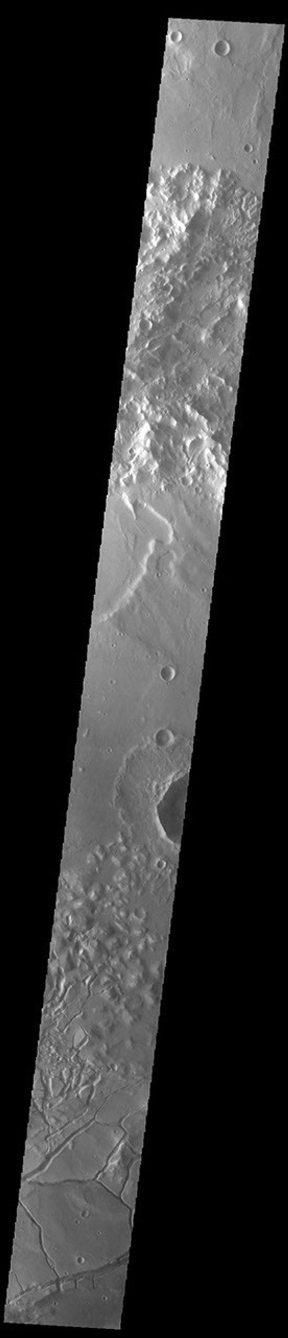 This image from NASA's Mars Odyssey shows part of Gorgonum Chaos. Chaos terrain is typified by regions of blocky, often steep sided, mesas interspersed with deep valleys.