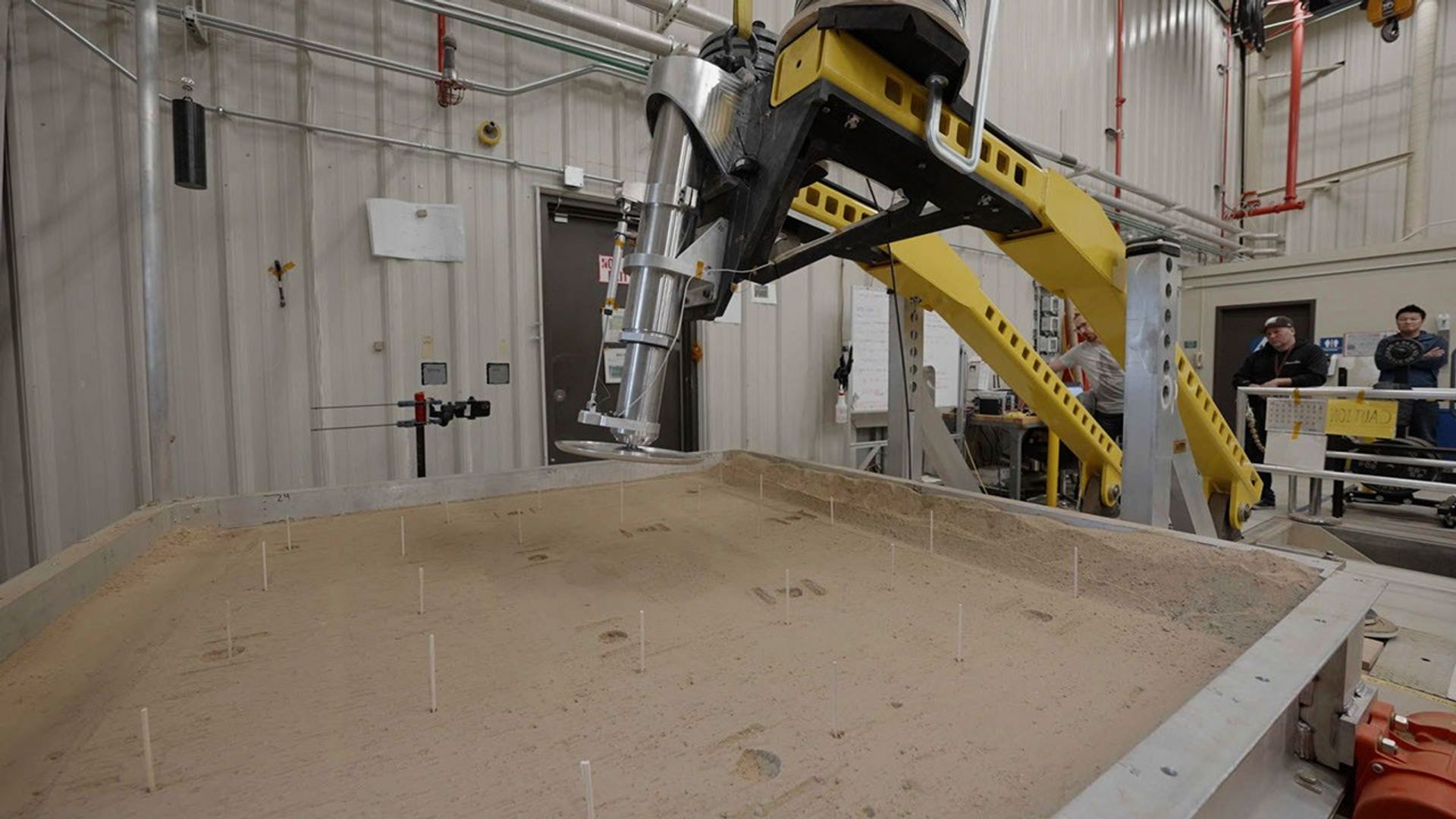 This setup is being used at JPL to test a 16-inch-diameter (40-centimeter-diameter) footpad for a future Mars lander.