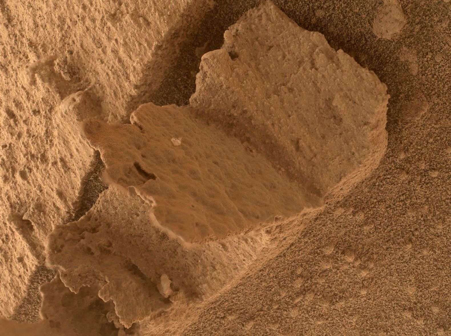 NASA's Curiosity Mars rover took this close-up view of a rock nicknamed Terra Firme that looks like the open pages of a book, on April 15, 2023, using the Mars Hand Lens Imager (MAHLI) on the end of its robotic arm.