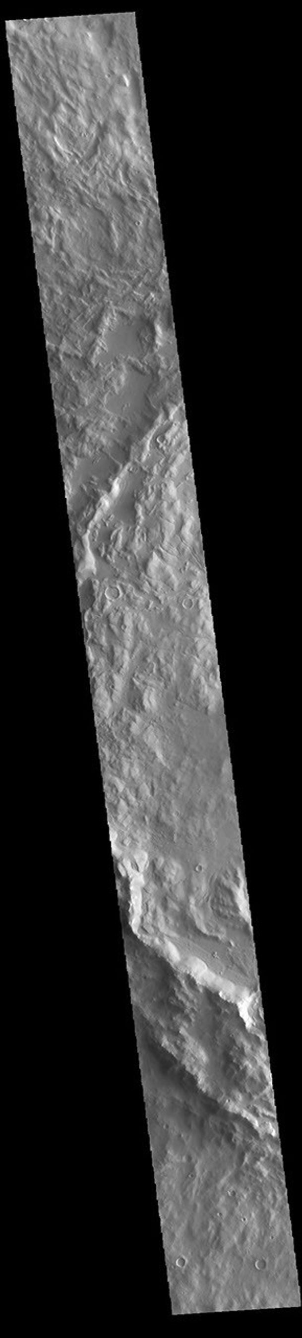 This image from NASA's Mars Odyssey shows the western side of Cerulli Crater. Located in northern Arabia Terra, Cerulli Crater is 114 km (71 miles) in diameter.