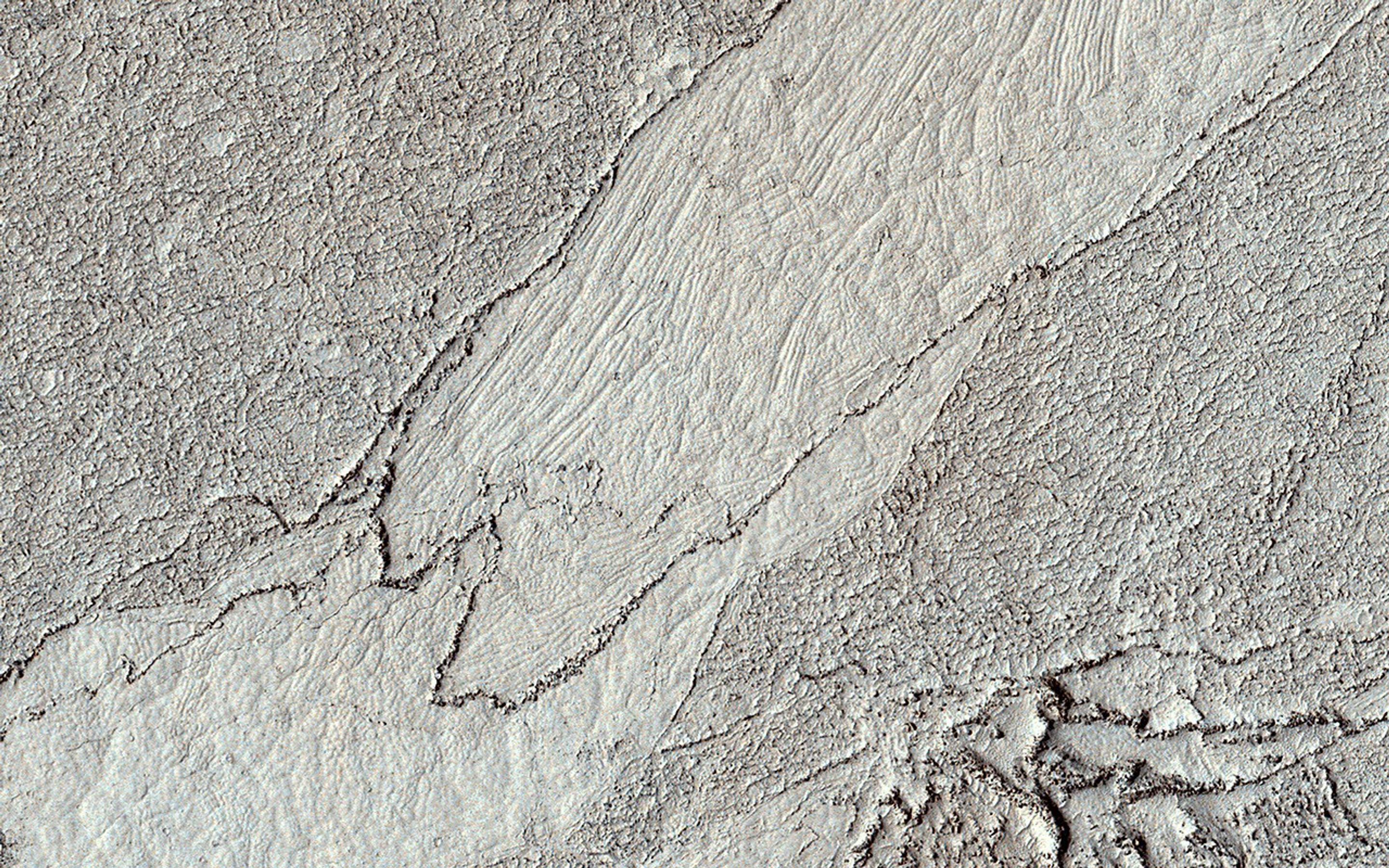 This image acquired on January 3, 2023 by NASA's Mars Reconnaissance Orbiter shows a classic example of platy-ridged lava. Scientists think that this is the same as a lava type called rubbly pahoehoe on Earth.